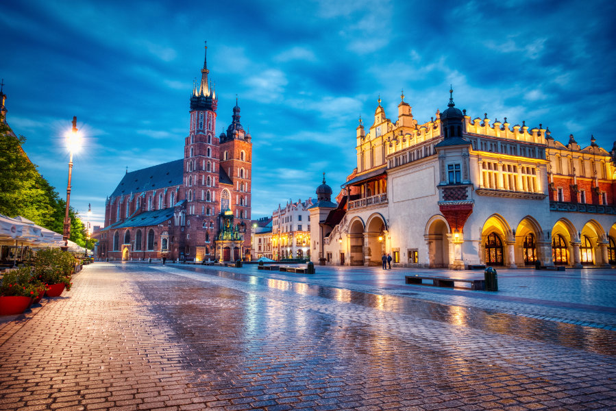 St. Mary's Basilica on the Krakow Main Square at Dusk, Krakow best places to go in europe in october - Krakow